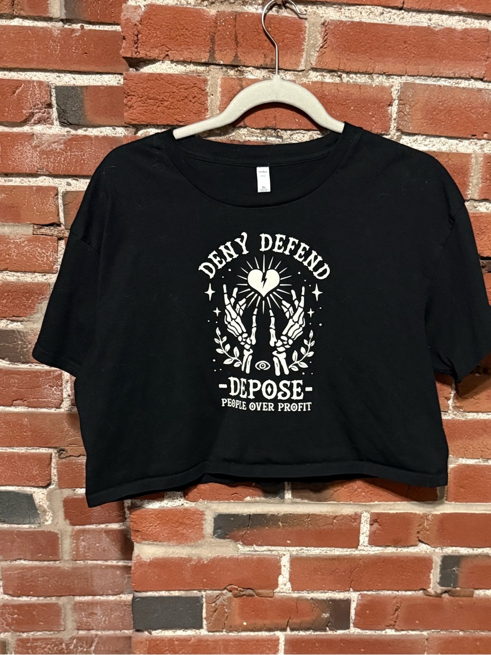Black Graphic Crop Tee with 'Deny Defend Depose' Print